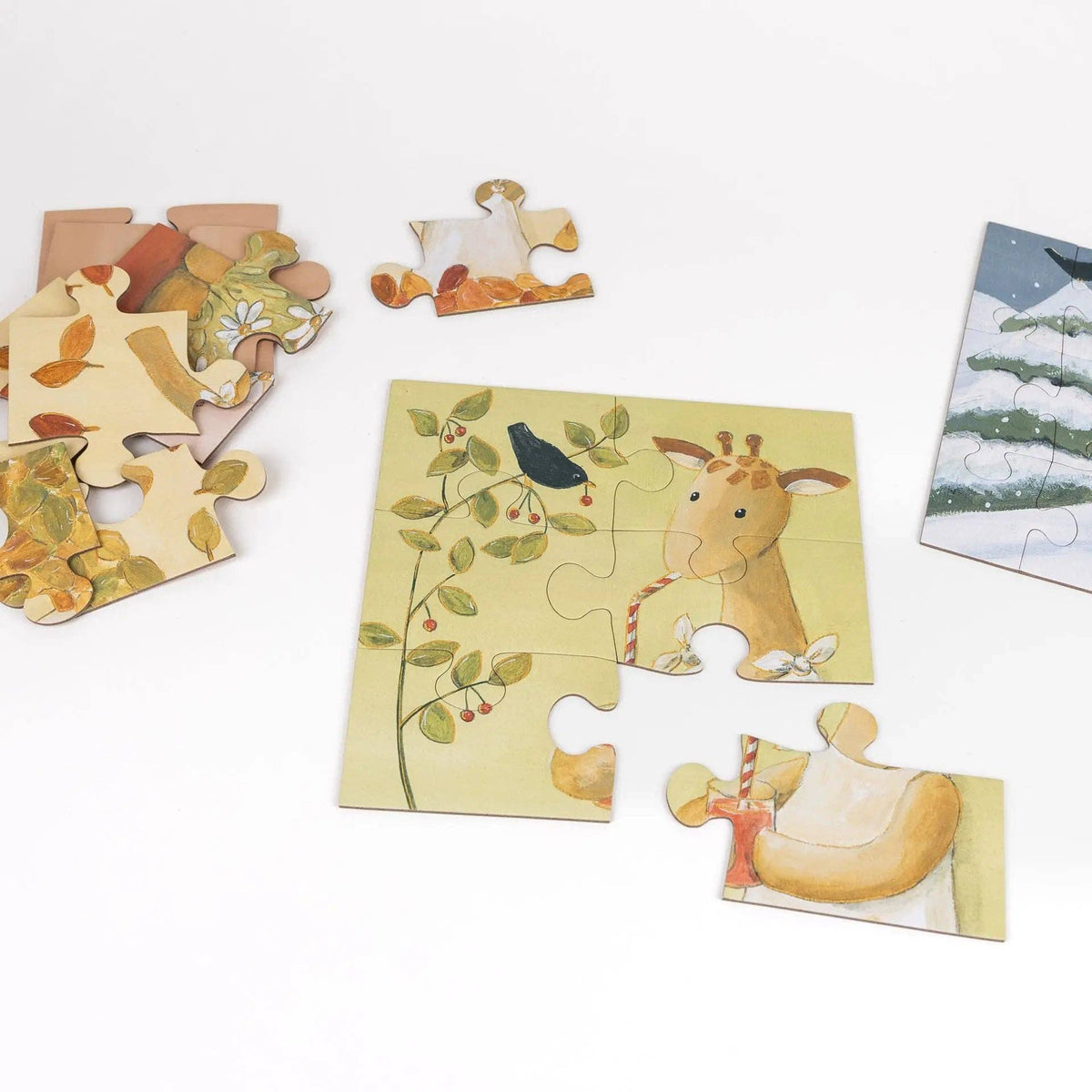 Leonie la girafe — Puzzles saisonniers (lot de 4)