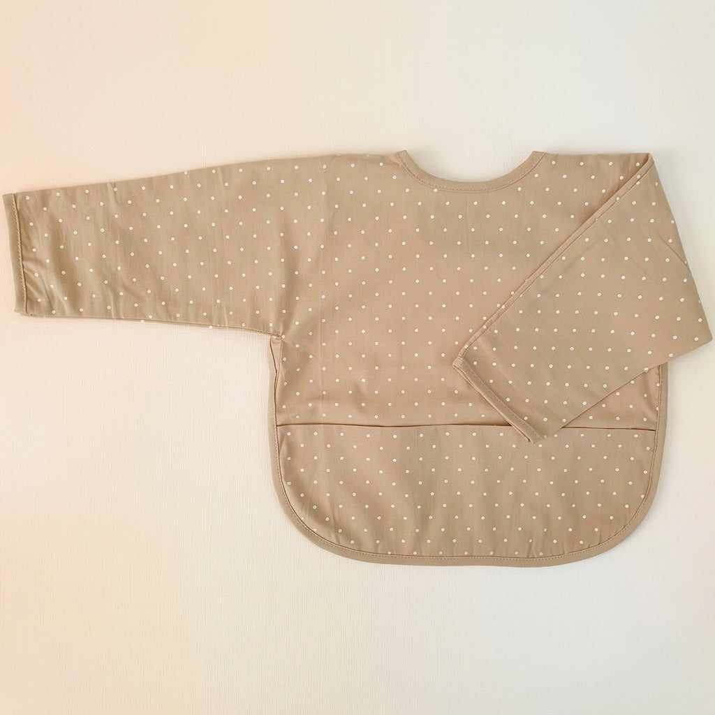 Bavoir bébé à manches en coton bio, sable à pois – Bientôt disponible