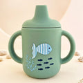 Tasse d’apprentissage bébé en silicone vert camée – Bientôt disponible